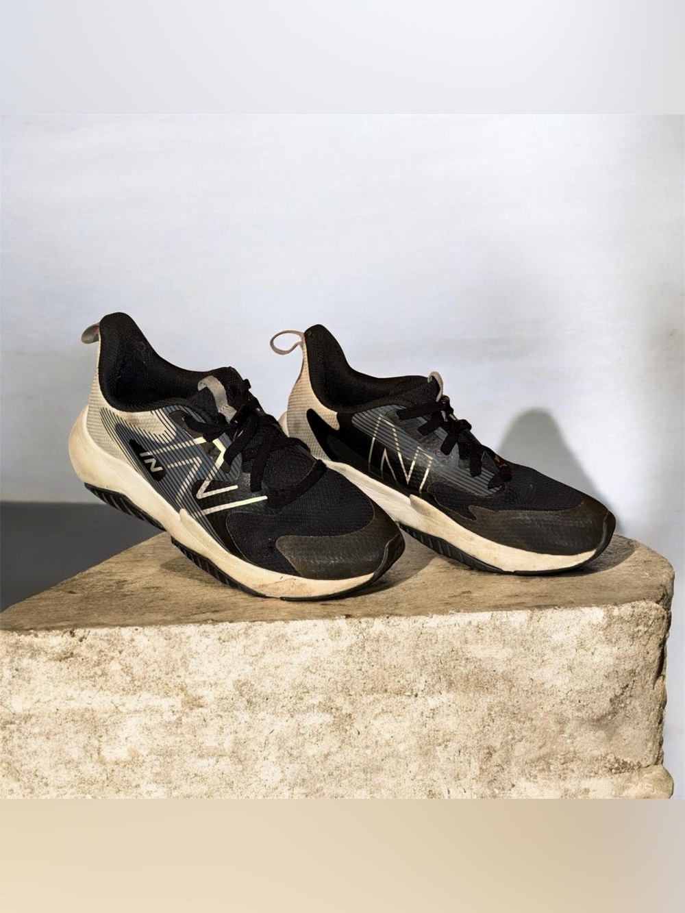 New Balance Black and Cream Athletic Running Shoes